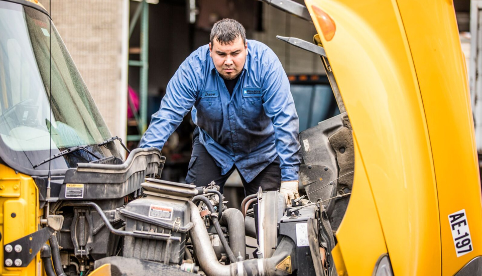 truck-repair-truck-maintenance-david-aguilar-inspecting-engine