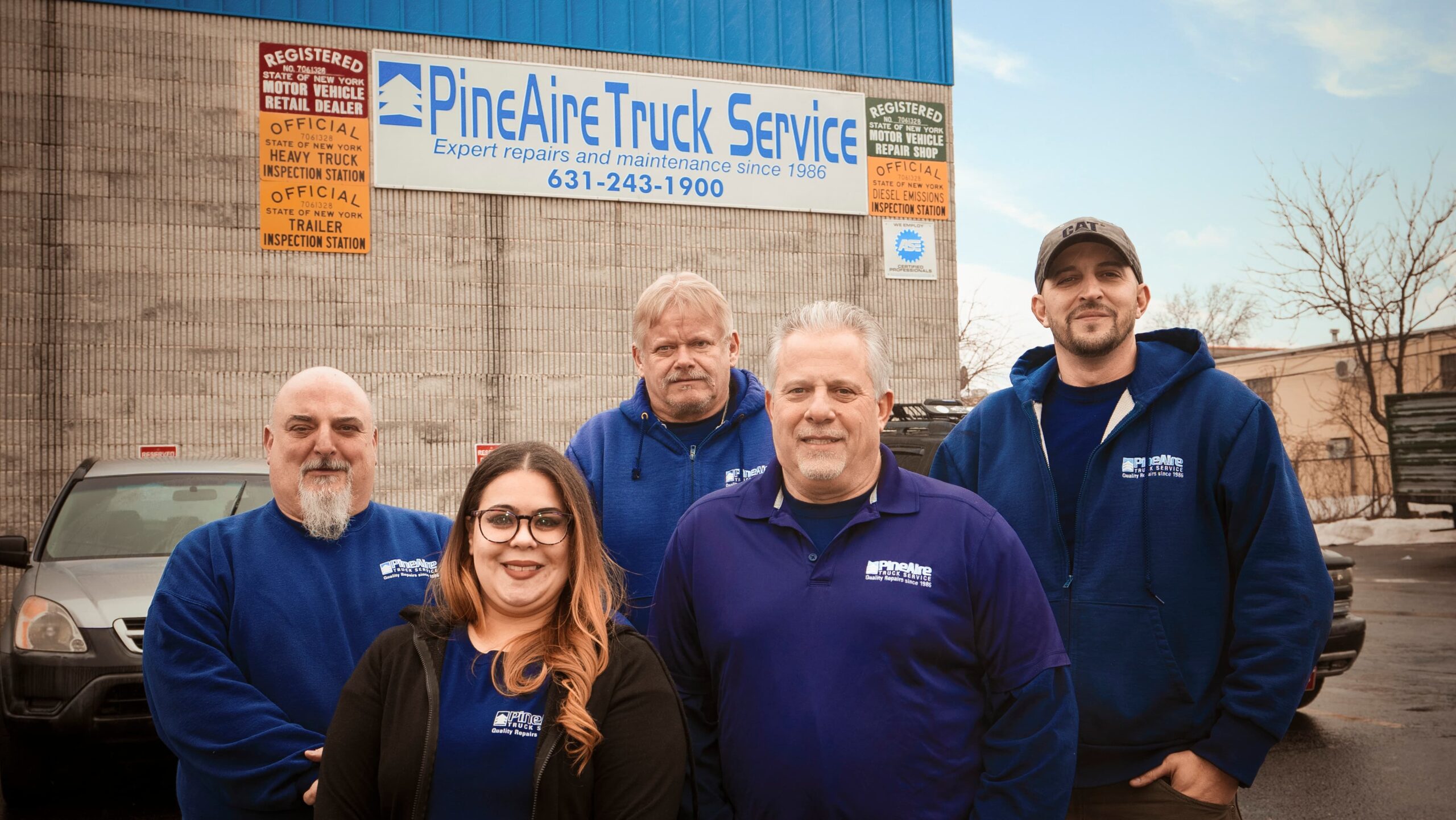 Small group picture of pine aire truck employees