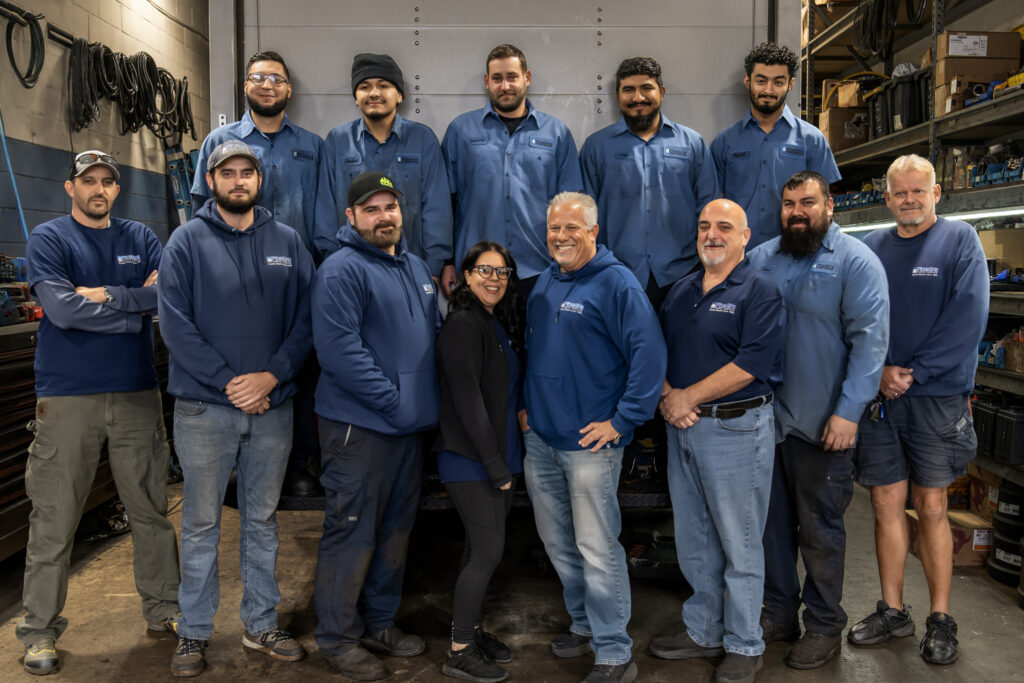 Picture of Pine Aire Truck and team folding arms