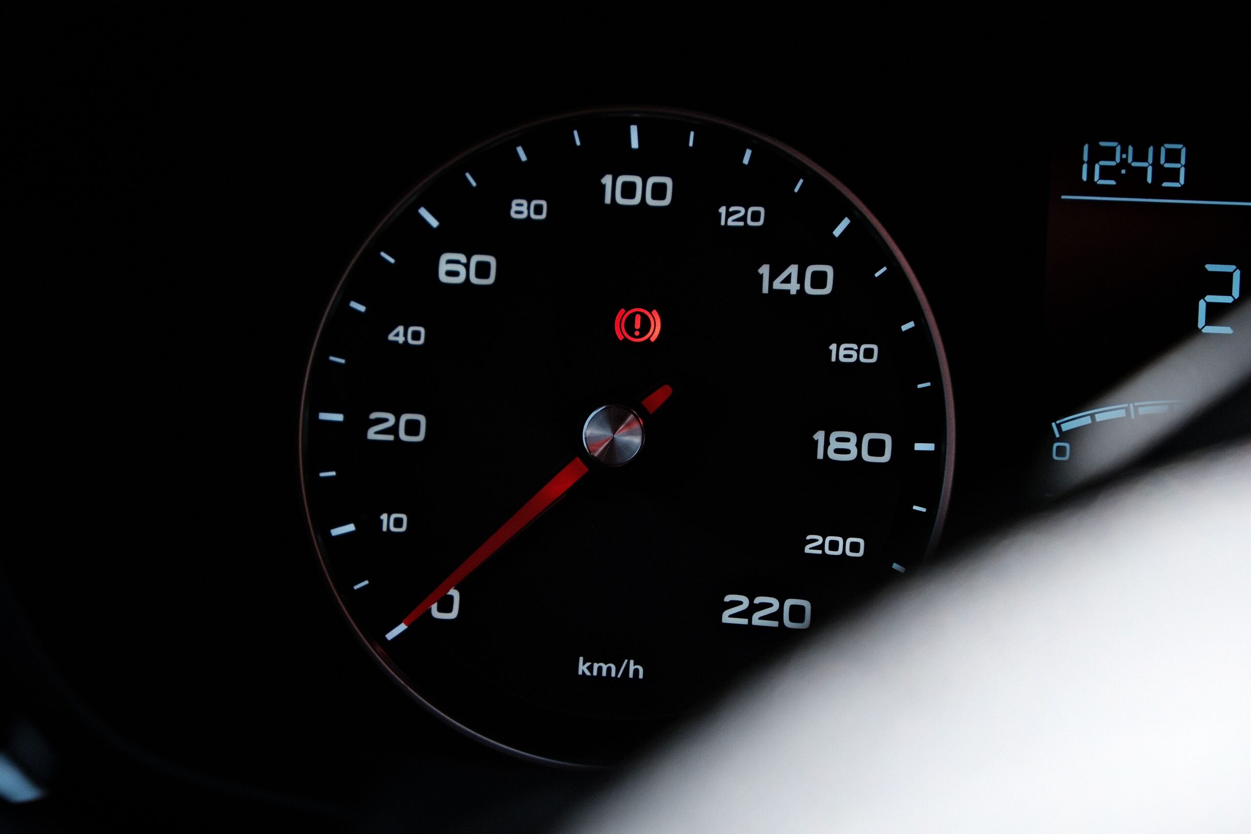 Picture of a tire pressure light flashing on a vehicle's dashboard